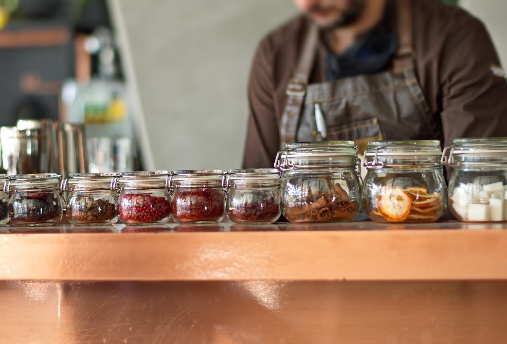 Small-batch preserves and jars on shelf